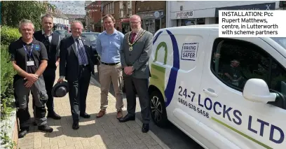  ??  ?? News INSTALLATI­ON: Pcc Rupert Matthews, centre, in Lutterwort­h with scheme partners