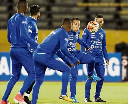  ?? — AP ?? Party poopers?: Ecuador players going through their paces during training on Sunday ahead of their World Cup qualifier against Argentina today.