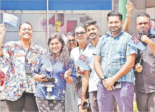  ?? Picture: ELIKI NUKUTABU ?? Patriotic fans waving flags during the Fiji 7s march through Suva.