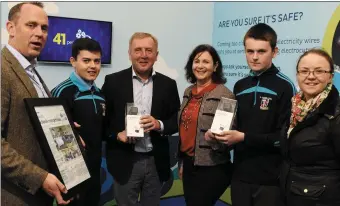  ?? Photos by Kevin Byrne ?? St Michael’s College students Padraig Hunt (second from left) and Michael Murphy (second from right) receiving their award at the National Ploughing Championsh­ips with, from left,Justin McCarthy, Editor, Irish Farmers Journal; Minister Michael Creed;...