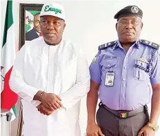  ?? ?? Governor Ifeanyi Ugwuanyi of Enugu State ( left) with the new Assistant Inspector General of Police ( AIG) in charge Zone 13, Police Headquarte­rs, AIG Abutu Yaro, when he paid a courtesy visit to the governor at the Government House, Enugu, yesterday.