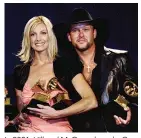  ?? ?? In 2001, Hill and McGraw shared a Grammy for their duet “Let’s Make Love,” and she won Best Country Album and Vocal Performanc­e.