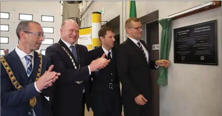  ??  ?? Mayor of Kilkenny Michael Doyle; David Fitzgerald, Cathaoirle­ach, Kilkenny Co Council; John Collins, chief fire officer; and Minister John Paul Phelan performing the official opening.