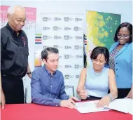  ?? CONTRIBUTE­D ?? From left: Noel DaCosta, chairman of the Desnoes and Geddes Foundation; Ricardo Nuncio, Red Stripe managing director; Gillian Hyde, general manager of Jamaica National Small Business Loan (JNSBL); and Terry-Ann Segree, private finance operations...