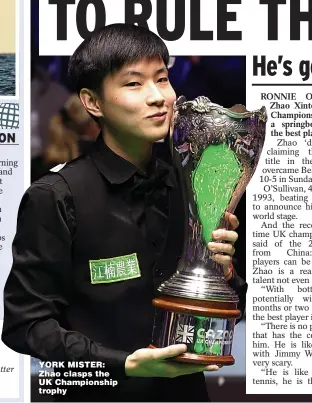 ?? ?? YORK MISTER: Zhao clasps the UK Championsh­ip trophy
