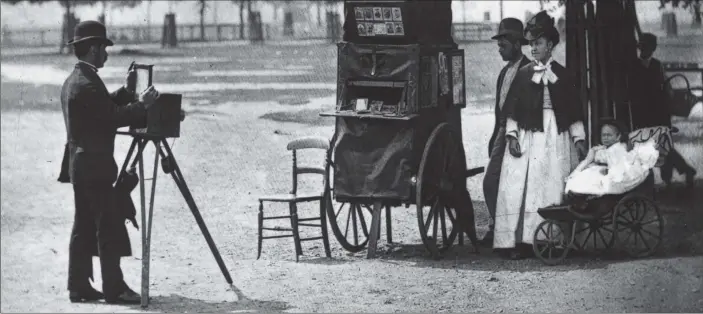  ?? PICTURE: JOHN THOMSON/GETTY IMAGES. ?? SNAPSHOT OF HISTORY: A street photograph­er in 1877 at work on Clapham Common, London, with a mobile booth. Originally published in ‘Street Life in London’ by John Thomson and Adolphe Smith.