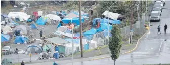  ??  ?? Nanaimo’s tent city, ordered to close by Friday, has been in place for five months and has grown to be the largest in the province.