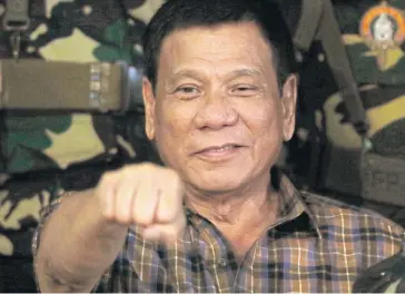  ??  ?? UNCOMPROMI­SING: Philippine President Rodrigo Duterte unleashed a drug crackdown in which nearly 2,000 have been killed.