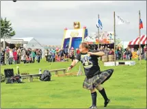  ??  ?? Heavy weight events got under way with the shotput competitio­n. 21_ F32 Arisaig Games_ shotput 01