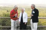  ?? BRENNAN LINSLEY/ASSOCIATED PRESS ?? Federal Reserve Chair Janet Yellen, center, chats with colleagues Stanley Fischer, left, and Bill Dudley at the Jackson Lake Lodge in Moran, Wyoming.