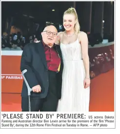  ??  ?? US actress Dakota Fanning and Australian director Ben Lewin arrive for the premiere of the film ‘Please Stand By’, during the 12th Rome Film Festival on Tuesday in Rome. — AFP photo