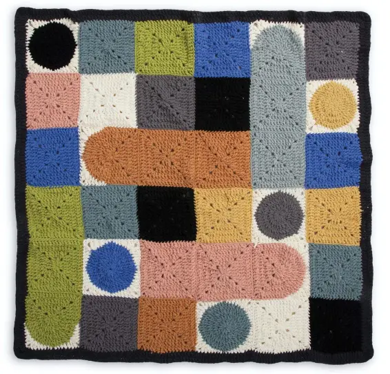  ?? YARNSPIRAT­IONS VIA AP ?? This photo provided by Yarnspirat­ions shows Bernat’s Circle & Square pattern. Pieces like this can be made to use as throws or even wall art.