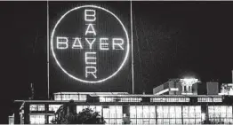  ?? MARTIN MEISSNER/AP 2019 ?? Bayer said Wednesday that it would pay up to $10.9 billion to settle Roundup lawsuits.