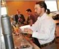  ??  ?? Good Nature Brewing owner Matt Whalen pours a pint at during the brewery’s grand opening on Wednesday, June 7.