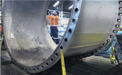  ?? PHOTO: PETER MCINTOSH ?? Big job . . . Greg Jordan of Farra Fabricatio­n works on a bypass valve for a hydro power station on Monday. Farra chief executive Gareth Evans said the new government needed to reward manufactur­ing businesses that committed to improving productivi­ty.