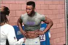  ?? TOM CANAVAN/AP PHOTO ?? New York Giants running back Saquon Barkley talks to the media after practice on Monday at East Rutherford, N.J.