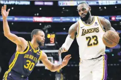  ?? AP ?? GREAT STAKES: Stephen Curry’s Warriors and LeBron James’ Lakers each must earn their way into the Western Conference playoffs.