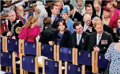  ?? ?? (From L) Britain’s Prince Andrew, Princess Beatrice of York, Edoardo Mapelli Mozzi, Princess Eugenie, Jack Brooksbank and Prince Harry.