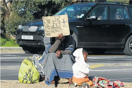  ?? /Esa Alexander ?? Rich man, poor man: The poor majority are witness to already privileged black recipients receiving most of the advantages, while the working class and the unemployed remain stuck at the bottom.