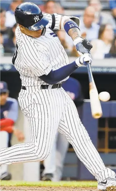  ?? AP ?? Gleyber Torres hits a grand slam during the first inning on Friday night in win over Boston in Bronx.