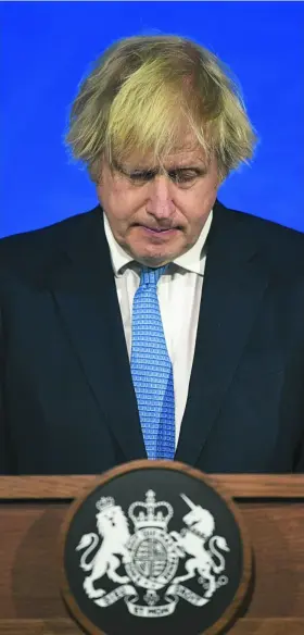  ?? AP ?? El «premier» Boris Johnson promete tomarse una pinta en un «pub» el lunes 12 de abril