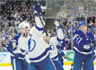  ?? FRANK GUNN, THE CANADIAN PRESS ?? Tampa Bay Lightning defenceman Victor Hedman celebrates his goal against the Toronto Maple Leafs during first period NHL first-round playoff series action in Toronto on Wednesday.