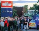  ??  ?? Protest: Farmers at a dairy last night