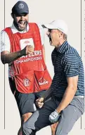  ??  ?? Audacious: Jordan Spieth celebrates his winning shot with caddie Michael Greller