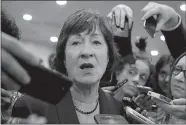  ?? J. SCOTT APPLEWHITE/AP PHOTO ?? Sen. Susan Collins, R-Maine, speaks amid a crush of reporters Thursday in Washington after Republican­s released their long-awaited bill to scuttle much of former President Barack Obama’s Affordable Care Act.