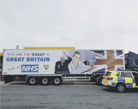  ??  ?? CONVOY: The trucks ready to set off from Hartshead Moor Services (Picture Motorway Martin @WYP_PCWILLIS)