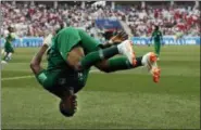  ?? DARKO VOJINOVIC — THE ASSOCIATED PRESS ?? Saudi Arabia’s Salem Aldawsari celebrates with a flip after scoring his side’s second goal during the group A match between Saudi Arabia and Egypt at the 2018 soccer World Cup at the Volgograd Arena in Volgograd, Russia, Monday.