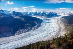  ?? BRIAN MENOUNOS VIA AP ?? The Klinaklini glacier in British Columbia, Canada is shown in 2017. The glacier and the adjacent icefield lost about 15gigatons of water from 2000-2019, researcher Brian Menounos says. And the rate of loss accelerate­d over the last five years of the study.