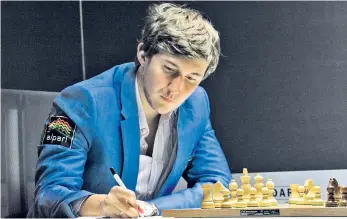  ??  ?? Va banque und ultracool in fast aussichtsl­oser Lage: Sergej Karjakin.