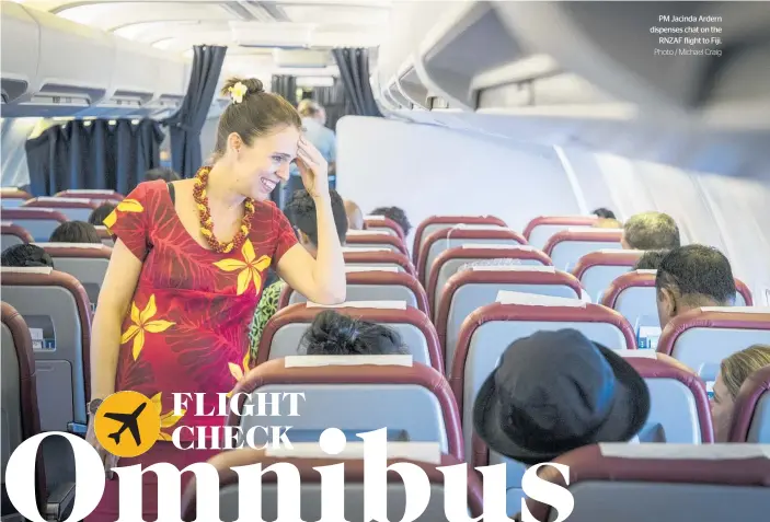  ?? Photo / Michael Craig ?? PM Jacinda Ardern dispenses chat on the RNZAF flight to Fiji.