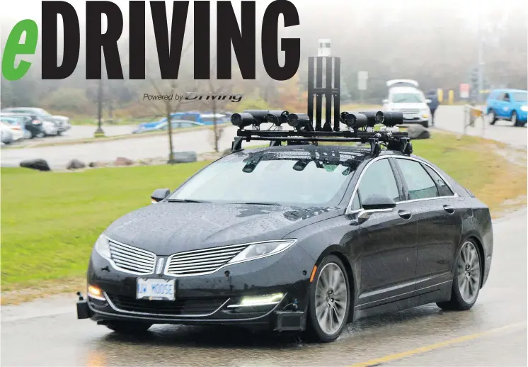  ?? GRAEME FLETCHER/DRIVING ?? The University of Waterloo’s Autonomoos­e, based on a Lincoln MKZ sedan, performed well as a self-driving vehicle even in poor weather conditions.