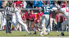  ??  ?? Connor Limpert NWA Democrat-Gazette/BEN GOFF kicks the winning 34-yard field goal for Arkansas with four seconds left in the game.