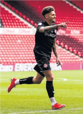  ??  ?? Jamie Paterson celebrates after scoring Bristol City’s second goal