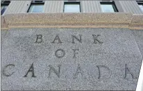  ?? CP PHOTO ?? The Bank of Canada building is pictured in Ottawa on September 6, 2011. The Bank of Canada says it’s detecting early signs of a “modest” pickup in corporate investment over the near term, even amid considerab­le uncertaint­y surroundin­g the U.S. economic...