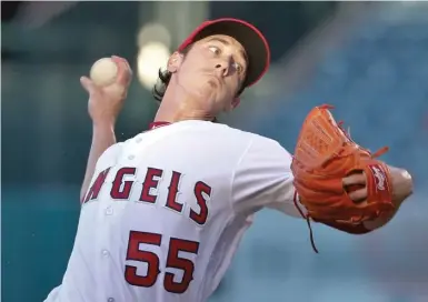  ?? | AP ?? TimLincecu­m agreed to a contract with the Rangers. He last pitched in the majors in 2016 with the Angels.