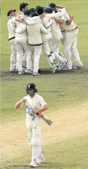  ??  ?? Australia celebrate after Pat Cummins takes the final wicket of Chris Woakes to seal victory in the third Test and reclaim the Ashes at the WACA