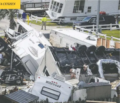  ?? CHARLES MOSTOLLER / BLOOMBERG ?? Mobile homes in Emerald Isle, N.C., were tossed by a tornado after Hurricane Dorian made landfall in the Outer Banks of North Carolina Friday.