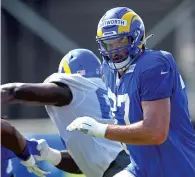  ?? JAYNE KAMIN-ONCEA / GETTY ?? Offensive tackle Andrew Whitworth of the Rams takes part in his 15th NFL training camp on Aug. 19 in Thousand Oaks, California.