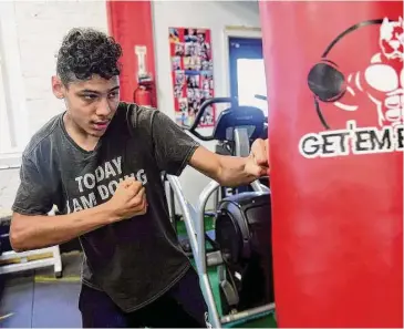  ?? Arnold Gold/Hearst Connecticu­t Media ?? Matthias Cruz, 16, of New Haven, practices punching and movement at the Get ‘Em Boy Boxing Gym in New Haven on Thursday.