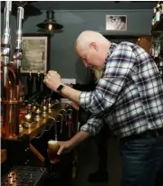  ?? ?? Pulling a pint of real ale at Saturday’s launch of Reading Ale Trail at The Retreat