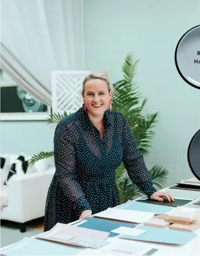  ??  ?? ABOVE Interior designer Annabel Berry of Design Federation. BELOW A farmhouse-style kitchen finished in Resene Robin Egg Blue. BELOW An unusual use of colour with a hallway ceiling painted in Resen Safehaven; the walls are in Resene Half Merino.