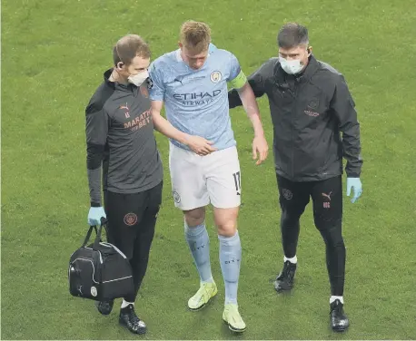  ?? ?? Manchester City's Kevin De Bruyne leaves the game with an injury during the UEFA Champions League final match against Chelsea last season.