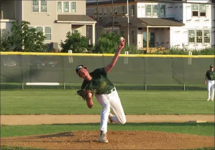  ?? MIKE CABREY — MEDIANEWS GROUP ?? Nor-Gwyn’s Gavin Mikulski throws a pitch during the Hawks’ Bux-Mont American Legion game against Quakertown Wednesday.