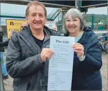  ?? Photograph: Alison MacKenzie. ?? Former CalMac chief engineer Ken MacKenzie is presented with a retirement to-do list from his wife, Alison.