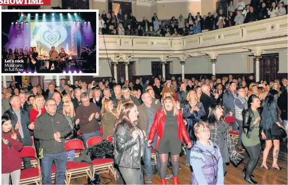  ??  ?? Let’s rock Musicians in full flow Get up and dfance The audience was transporte­d back to theheady days of The Biungalow . Pictures: John McCarney