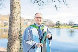  ?? ?? Degree Marine biologist Professor Sir Ian Boyd with his honorary degree from the University of Stirling